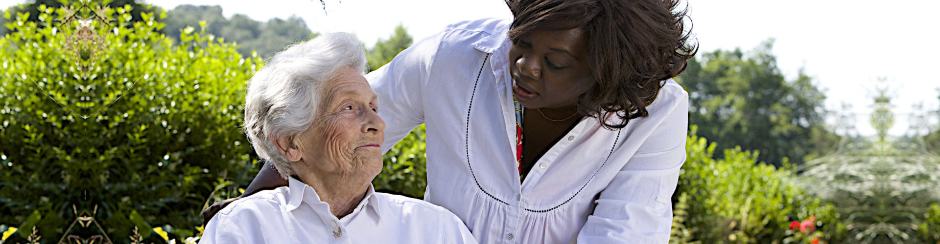 senior woman and her caregiver outdoor